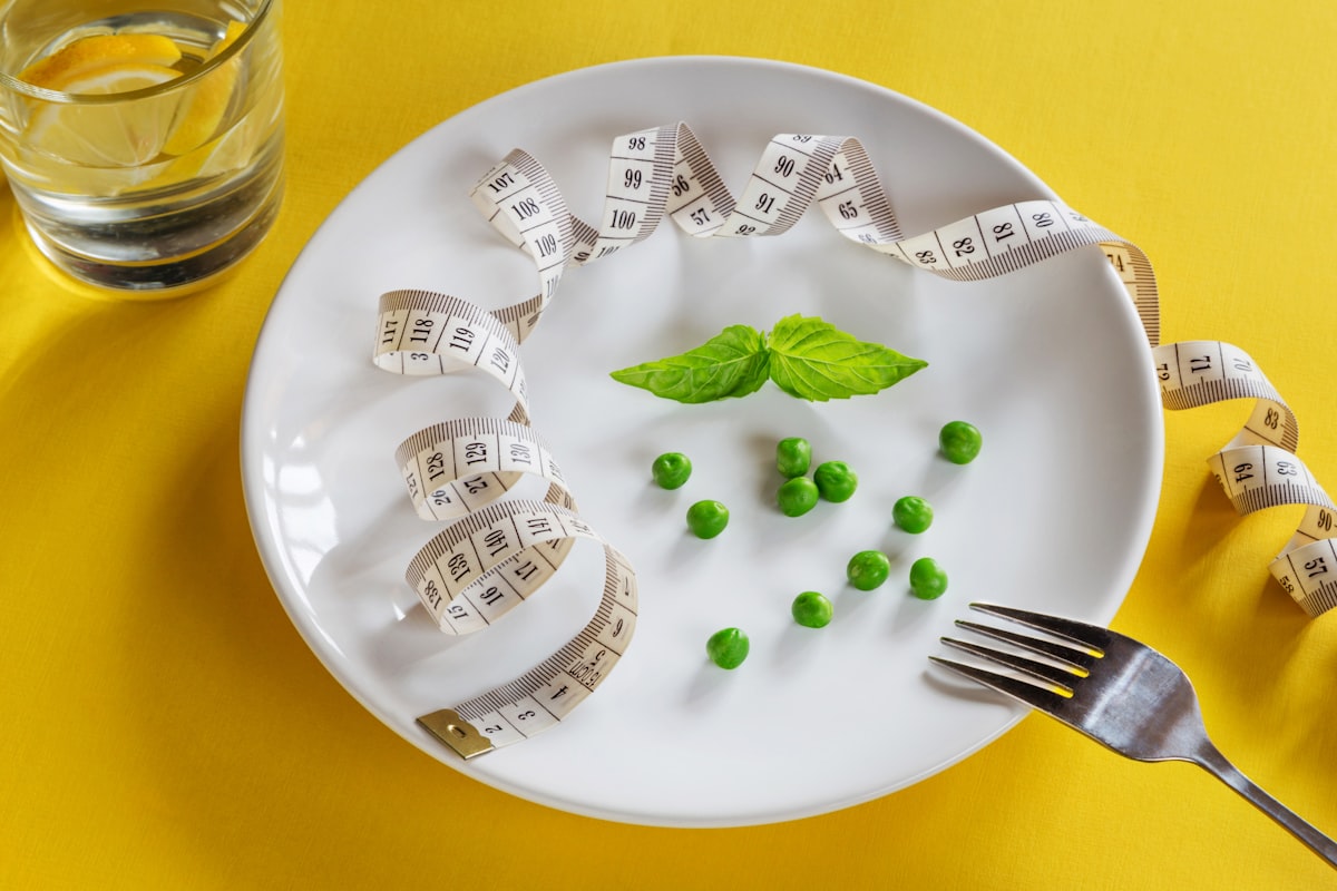 Plate with balanced portions of vegetables, protein and whole grains
